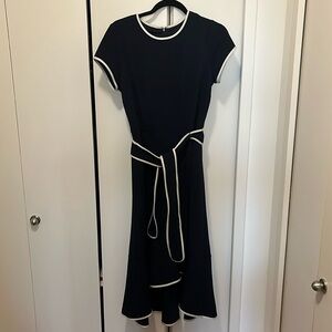 Short sleeve navy blue dress with white piping